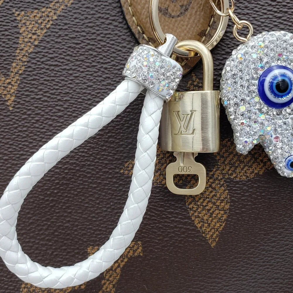 Authentic Louis Vuitton Lock & Key with unbranded Evil Eye Bagcharm